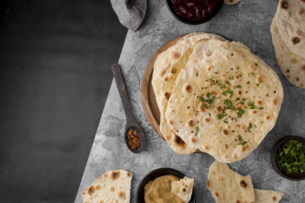 delicious-roti-assortment-table-with-copy-space
